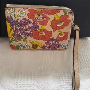 COACH floral wristlet